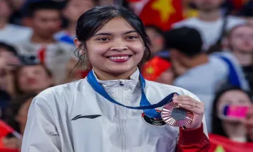 Jadi Atlet Pertama yang Pakai Seragam Podium, Gregoria: Bangga Banget